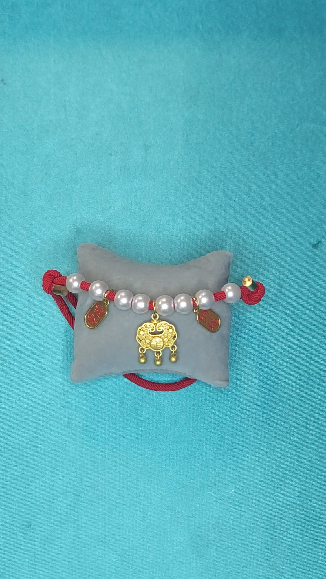 Custom Pet Necklace displayed on marble display stand